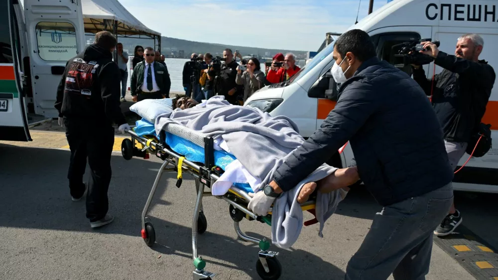 An injured crew member from a ship damaged in a drone attack is moved on a stretcher after being rescued after one vessel was sunk and another damaged in the Black Sea, in Varna, Bulgaria, October 6, 2026. REUTERS/Petko Momchilov   TPX IMAGES OF THE DAY