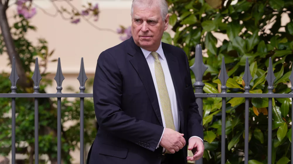 FILE - Britain's Andrew Mountbatten-Windsor, formerly known as Prince Andrew, looks round as he leaves after attending the Easter Matins Service at St. George's Chapel, Windsor Castle, England, April 20, 2025. (AP Photo/Kirsty Wigglesworth, File)