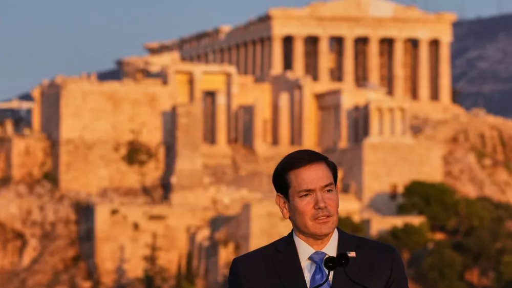 U.S. Secretary of State Marco Rubio speaks at the Pnyx hill, where ancient Athenians held democratic assemblies, with the ancient Parthenon temple atop the Acropolis in the background, in Athens,Wednesday, Oct. 7, 2026. (AP Photo/Mark Schiefelbein, Pool)