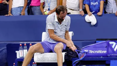Tennis - U.S. Open - Flushing Meadows, New York, United States - August 25, 2025 Russia's Daniil Medvedev breaks his racquet after his first round match against France's Benjamin Bonzi REUTERS/Eduardo Munoz