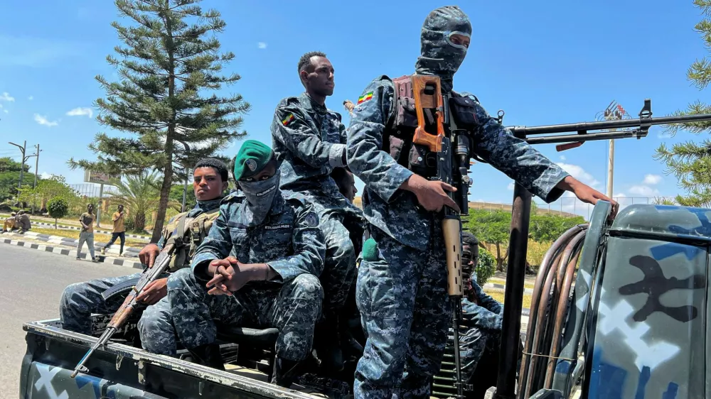 Members of the Ethiopian Federal Police (EFP) patrol after Tigray People's Liberation Front (TPLF) army retreated from the regional capital near the Tigray Martyrs monument in Mekelle, Tigray Region, Ethiopia, October 8, 2026. Picture taken with a mobile phone. Obtained by REUTERS