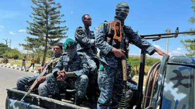 Members of the Ethiopian Federal Police (EFP) patrol after Tigray People's Liberation Front (TPLF) army retreated from the regional capital near the Tigray Martyrs monument in Mekelle, Tigray Region, Ethiopia, October 8, 2026. Picture taken with a mobile phone. Obtained by REUTERS