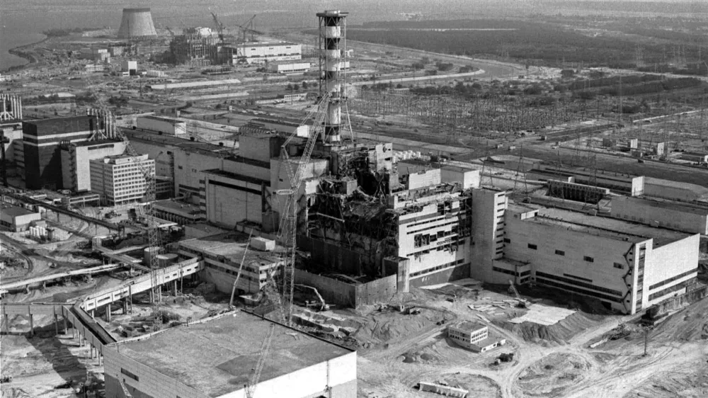 FILE - This aerial view shows the Chernobyl nuclear power plant in Chernobyl, Ukraine, April 26, 1986. (AP Photo/Volodymyr Repik, File)