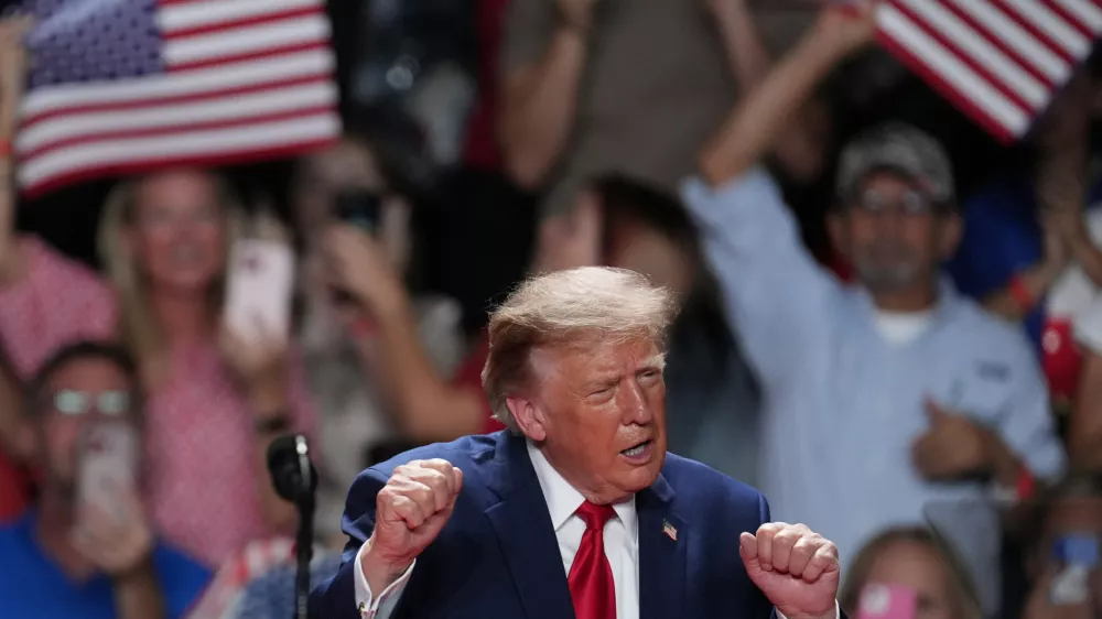 President Donald Trump dances at a campaign rally at the Freeman Coliseum in San Antonio, Wednesday, Oct. 7, 2026. (AP Photo/Eric Gay)