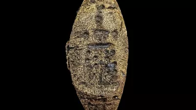 Story from Jam Press (Divers Ancient Ring)Pictured: Bronze signet-ring representing the Lighthouse of Alexandria discovered on the Royal Island of Antirhodos.PICTURES: Divers uncover lost 2,000-year-old ring inside Cleopatra's underwater 'sunken palace'Divers have discovered the first known ring depicting one of the Seven Wonders of the Ancient World.The extraordinary bronze signet shows the Lighthouse of Alexandria, which once towered over the Egyptian city and guided ships safely into its harbour.It was recovered from the remains of a submerged royal palace on Antirhodos, an island that formed part of Alexandria's ancient Royal Quarters before disappearing beneath the Mediterranean.The tiny treasure was found during underwater excavations led by French archaeologist Franck Goddio and the European Institute for Underwater Archaeology, as reported by NeedToKnow.Pictures from the expedition show divers exploring the murky ruins with torches before bringing the heavily corroded ring to the surface.Despite spending centuries underwater, its raised design remains visible and bears a striking resemblance to depictions of the lighthouse found on some second-century Roman coins.Experts say it is the first known bronze ring-signet to carry an image of the celebrated structure.The location of the find could make it even more significant.Archaeologists believe parts of the sprawling palace may once have housed administrative offices &ndash; potentially including officials responsible for running the lighthouse.Franck said: "The discovery of the ring-signet is even more important as it has been excavated in the legendary palace of the Island of Antirhodos, that once was a centre of power."The palace was witnessed by Greek geographer Strabo when he visited Egypt between 29 and 25BC.Archaeologists have now uncovered architectural remains covering several thousand square metres beneath the waves.The wider royal district was once associated with some of the ancient world's most famous figures, including Cleopatra VII, Julius Caesar and Mark Antony.Alexandria was founded by Alexander the Great in 331BC and later became the capital of Egypt under the Ptolemaic dynasty.Its enormous lighthouse was built on the island of Pharos during the third century BC and is thought to have stood more than 100 metres tall.For centuries, it was among the tallest man-made structures on Earth and helped sailors navigate the dangerous approach to the bustling port.But repeated earthquakes badly damaged the lighthouse, and it eventually vanished, leaving the Great Pyramid of Giza as the only surviving member of the traditional Seven Wonders.Large areas of ancient Alexandria's waterfront also sank following earthquakes, tidal waves, subsidence and changes in sea level.Some remains now lie as much as eight metres beneath the surface.Egypt's Minister of Tourism and Antiquities, Sherif Fathy, and his assistant, Dr Ahmed Rehema, visited the expedition's research vessel to see the newly discovered ring and watch the underwater work.The mission has also been examining other sites around Alexandria's Eastern Harbour, with archaeologists recovering pottery, glassware and everyday objects spanning centuries of the city's history.Researchers hope continued work at Antirhodos will reveal more about how the palace operated and the people who lived and worked at the heart of ancient Alexandria.The excavations are being undertaken by the European Institute for Underwater Archaeology in collaboration with Egypt's Ministry of Tourism and Antiquities and with support from the Hilti Foundation.The institute has been investigating Alexandria's submerged ruins since 1992.ENDSEDITOR'S NOTE: Non-Exclusive Licence: A non-exclusive licence has been obtained directly from the verified copyright holder. The copyright holder retains the ability to license the content elsewhere.,Image: 1141372667, License: Rights-managed, Restrictions: EDITOR'S NOTE: Non-Exclusive Licence: A non-exclusive licence has been obtained directly from the verified copyright holder. The copyright holder retains the ability to license the content elsewhere., Model Release: no / Foto: Profimedia