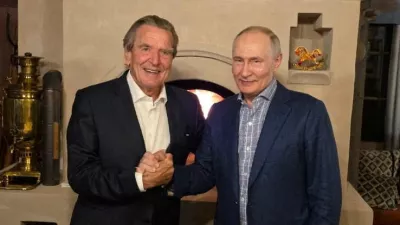 Russian President Vladimir Putin shakes hands with former German Chancellor Gerhard Schroeder during what the Kremlin described as a meeting at Putin's residence on the day of his 74th birthday, at an unidentified location in Russia, in this image released October 8, 2026. Kremlin.ru/Handout via REUTERS ATTENTION EDITORS - THIS IMAGE WAS PROVIDED BY A THIRD PARTY. MANDATORY CREDIT.