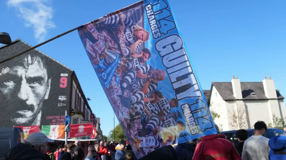 Fans gather for the English Premier League soccer match between Liverpool and Manchester City in Liverpool, England, Sunday, Oct. 11, 2026. (AP Photo/Jon Super)