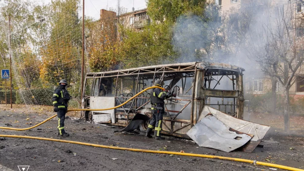 Firefighters work at the site of a Russian air strike, where a bus was hit, amid Russia's attack on Ukraine, in the city of Kramatorsk, in Donetsk region, Ukraine October 8, 2026. Press service of the State Emergency Service of Ukraine in Donetsk region/Handout via REUTERS ATTENTION EDITORS - THIS IMAGE HAS BEEN SUPPLIED BY A THIRD PARTY. DO NOT OBSCURE LOGO.