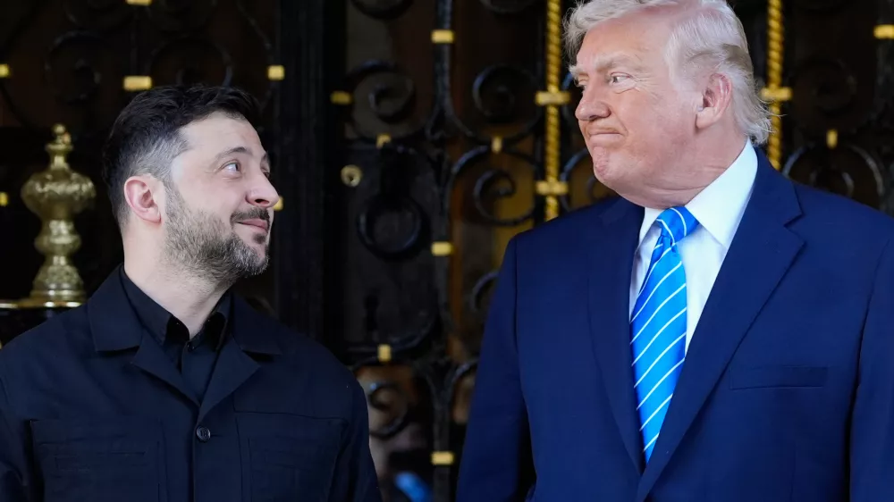 President Donald Trump greets Ukraine's President Volodymyr Zelenskyy at his Mar-a-Lago club, Sunday, Dec. 28, 2025, in Palm Beach, Fla. (AP Photo/Alex Brandon)
