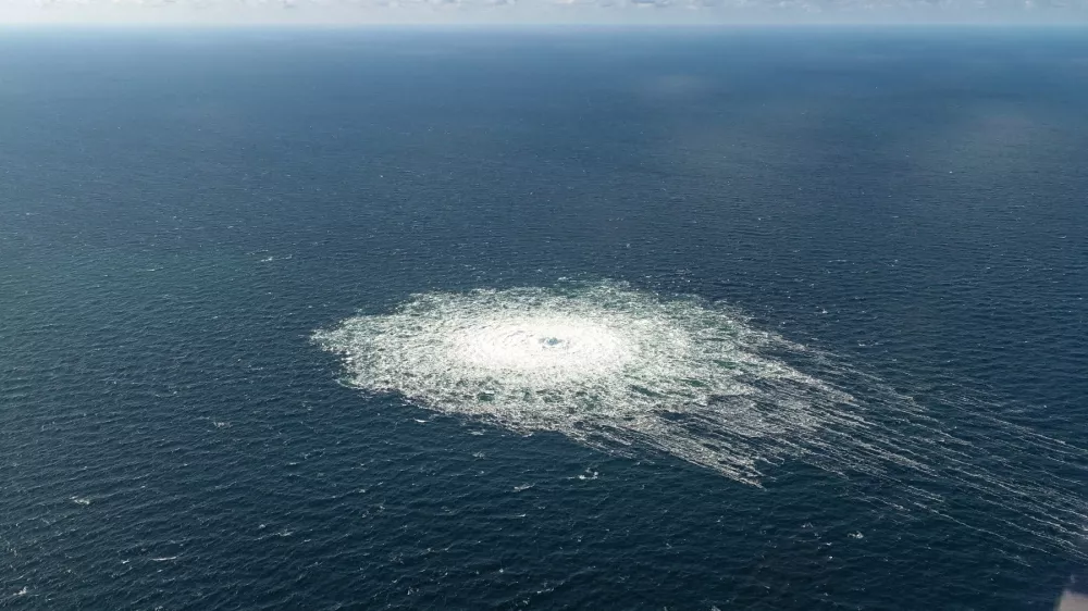 FILE PHOTO: Gas leak at Nord Stream 2 as seen from the Danish F-16 interceptor on Bornholm, Denmark September 27, 2022. Danish Defence Command/Forsvaret Ritzau Scanpix/via REUTERS ATTENTION EDITORS - THIS IMAGE WAS PROVIDED BY A THIRD PARTY. DENMARK OUT. NO COMMERCIAL OR EDITORIAL SALES IN DENMARK/File Photo
