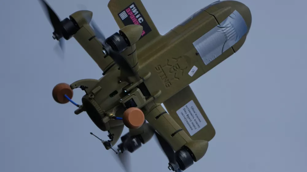 In this file photo taken Thursday, March 19, 2026, a Sting interceptor drone flies during drills in the Kyiv region, Ukraine. (AP Photo/Efrem Lukatsky)