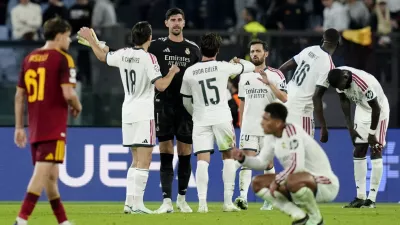 Soccer Football - UEFA Champions League - AS Roma v Real Madrid - Stadio Olimpico, Rome, Italy - October 14, 2026 Real Madrid's Thibaut Courtois celebrates with teammates after the match REUTERS/Matteo Ciambelli