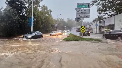 Vehicles drive along a partially flooded road during a heavy rain in Istanbul, Turkey, Wednesday, Oct. 14, 2026. (Omer Hamza Yildiz/DIA Photo via AP)