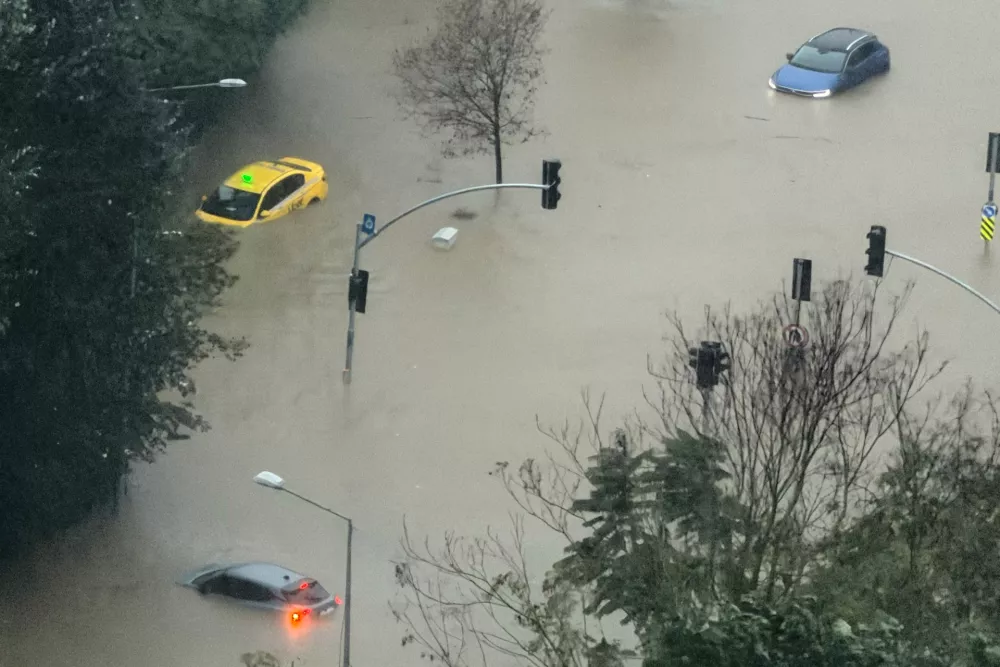 Vehicles are stranded in a partially flooded highway during heavy rains in Istanbul, Turkey, Wednesday, Oct. 14, 2026. (AP Photo/Egecan Ozguner)