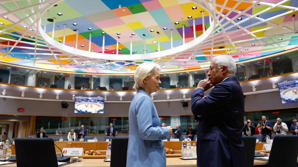 European Commission President Ursula von der Leyen, left, speaks with European Council President Antonio Costa during a round table meeting at the EU summit in Brussels, Thursday, Oct. 15, 2026. (AP Photo/Geert Vanden Wijngaert)