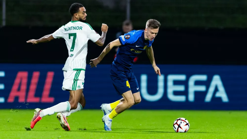 Jaden Montnor of FC Omonia vs Lukasz Bejger of NK Celje during football match between NK Celje (SLO) and FC Omonia (CYP) in league phase, Matchday 2 of UEFA Europa League 2026/27, on October 15, 2026 in Stadion Z'Dezele, Celje, Slovenia. Photo by Nik Moder // Moder Photo Agency,Image: 1143658541, License: Rights-managed, Restrictions:, Model Release: no 