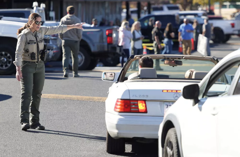 Emergency personnel direct traffic for parents and guardians in the parking lot of Journey Church for reunification following a shooting at Silver Rail Elementary School, in Bend, Oregon, US, October 15, 2026.  REUTERS/Rob Kerr