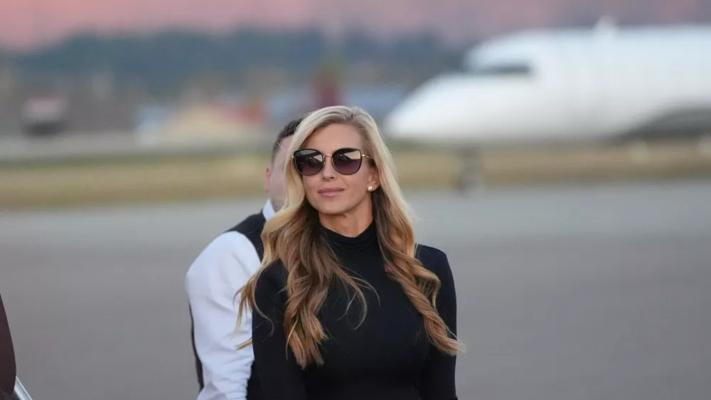 White House press secretary Katie Zacharia arrives with President Donald Trump at Glacier Park International Airport, Wednesday, Oct. 14, 2026, in Kalispell, Mont. (AP Photo/Alex Brandon)