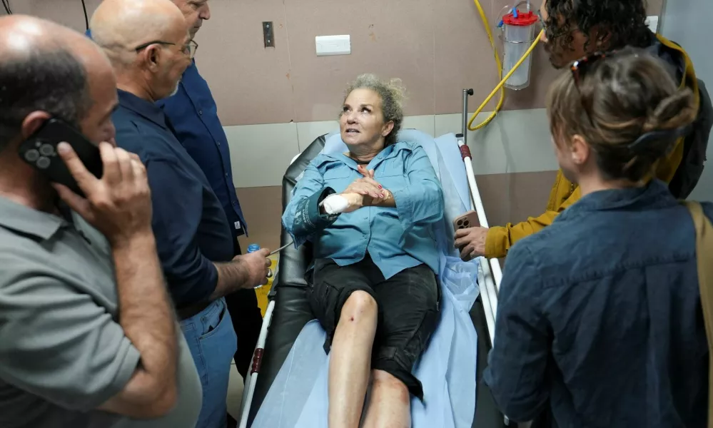 Heidi Levine, a photojournalist with the Washington Post, speaks to journalists at the hospital after sustaining multiple injuries during an attack by Israeli militant settlers on Palestinians harvesting olives, in Ramallah in the Israeli-occupied West Bank, October 16, 2026. REUTERS/Ali Sawafta