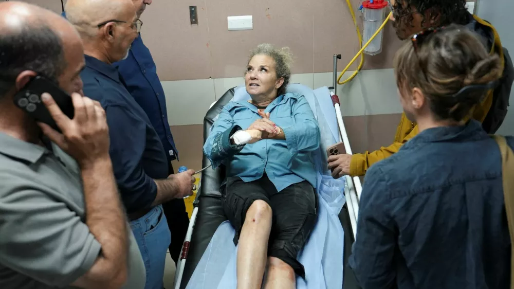 Heidi Levine, a photojournalist with the Washington Post, speaks to journalists at the hospital after sustaining multiple injuries during an attack by Israeli militant settlers on Palestinians harvesting olives, in Ramallah in the Israeli-occupied West Bank, October 16, 2026. REUTERS/Ali Sawafta