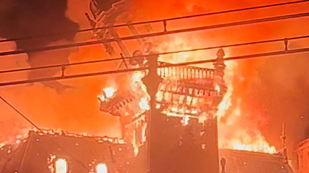 Fire in Limoges city hall amid protests, in Limoges, France, October 17, 2026, in this screengrab from a video obtained from social media. Lucas Destrem/via REUTERS THIS IMAGE HAS BEEN SUPPLIED BY A THIRD PARTY. MANDATORY CREDIT. NO RESALES. NO ARCHIVES. THIS IMAGE WAS PROCESSED BY REUTERS TO ENHANCE QUALITY, AN UNPROCESSED VERSION HAS BEEN PROVIDED SEPARATELY. TPX IMAGES OF THE DAY    VERIFICATION Reuters verified the location of the video from original file metadata and building structure that matched archive and satellite imagery of the area. The date matched Reuters reporting of a fire in Limoges city hall on October 17.