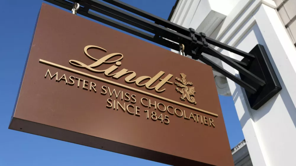 FILE PHOTO: Lindt signage is seen at their store at the Woodbury Common Premium Outlets in Central Valley, New York, U.S., February 15, 2022. REUTERS/Andrew Kelly/File Photo
