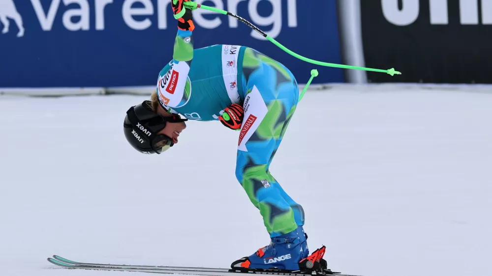 Slovenia's Ilka Stuhec celebrates at the finish area of an alpine ski, women's downhill race, at the Lillehammer World Cup Finals, in Kvitfjell, Norway, Saturday, March 21, 2026. (AP Photo/Marco Trovati)