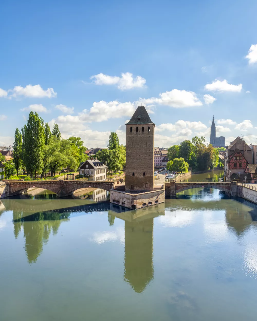 Strasbourg, medieval bridge Ponts Couverts and Cathedral in the bakground, vertical view from Barrage Vauban in Petite France. Alsace region, France