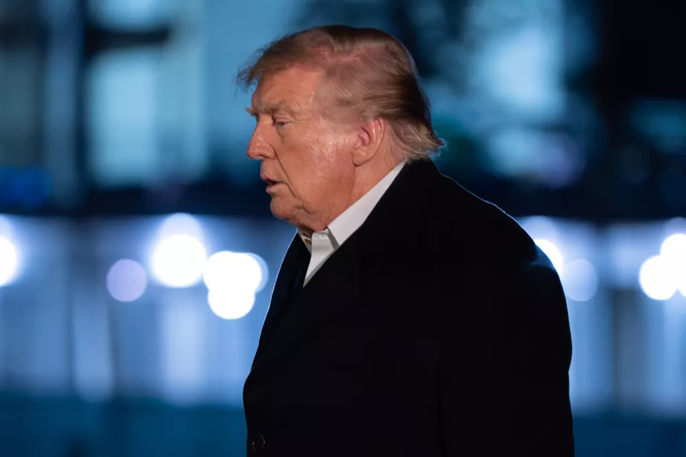 President Donald Trump walks on the South Lawn upon his arrival to the White House, Tuesday, Oct. 20, 2026, in Washington. (AP Photo/Jose Luis Magana)