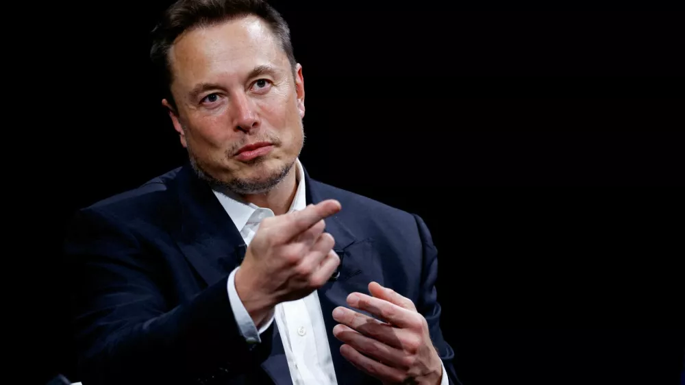 FILE PHOTO: Elon Musk, Chief Executive Officer of SpaceX and Tesla and owner of X, formerly known as Twitter, gestures as he attends the Viva Technology conference dedicated to innovation and startups at the Porte de Versailles exhibition centre in Paris, France, June 16, 2023. REUTERS/Gonzalo Fuentes/File Photo