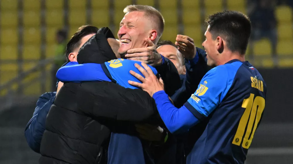 Soccer Football - UEFA Europa League - Celje v RB Salzburg - Stadion Z'dezele, Celje, Slovenia - October 22, 2026 Celje's Armandas Kucys celebrates scoring their second goal with teammates REUTERS/Ziga Zivulovic Jr.