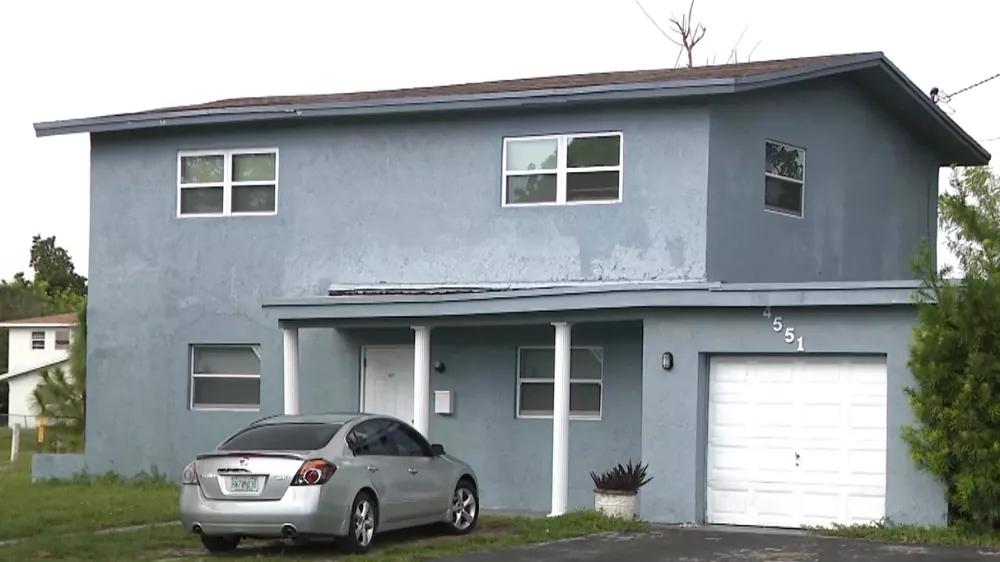 This undated image taken from video provided by WPLG-TV Thursday, Oct. 22, 2026, shows a home in Lauderhill, Fla., which a police officer is accused of illegally trying to take possession of after finding its' owner dead during a welfare check. (WPLG-TV via AP)