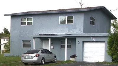 This undated image taken from video provided by WPLG-TV Thursday, Oct. 22, 2026, shows a home in Lauderhill, Fla., which a police officer is accused of illegally trying to take possession of after finding its' owner dead during a welfare check. (WPLG-TV via AP)