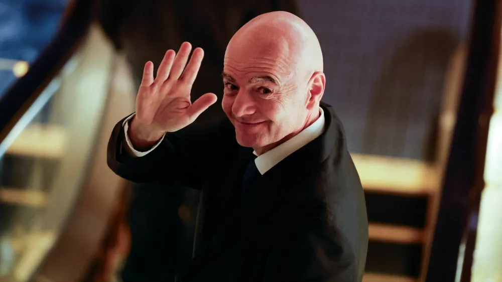 FIFA president Gianni Infantino gestures to reporters as he leaves from a venue for the Asian Football Confederation (AFC)'s extraordinary congress in Tokyo, Japan, October 23, 2026. REUTERS/Kim Kyung-Hoon