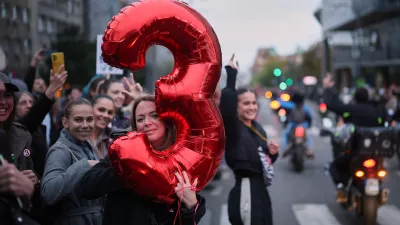 People gather for the final "Student List – Students Win" rally ahead of a parliamentary election in Belgrade, Serbia, Thursday, Oct. 22, 2026. (AP Photo/Armin Durgut)