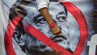 An activist from Swadeshi Jagran Manch, a wing of the Hindu nationalist organisation Rashtriya Swayamsevak Sangh (RSS), attends a protest against Elon Musk's Starlink, in New Delhi, India, October 23, 2026. REUTERS/Adnan Abidi   TPX IMAGES OF THE DAY