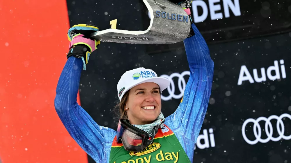 Alpine Skiing - FIS Alpine Ski World Cup - Women's Giant Slalom - Solden, Austria - October 24, 2026 Gold medallist Paula Moltzan of the U.S. celebrates on the podium after winning the women's giant slalom REUTERS/Angelika Warmuth