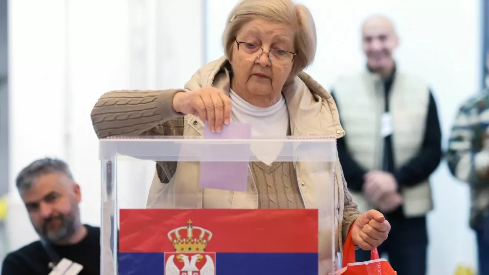 A woman votes at a polling station during the parliamentary election in Belgrade, Serbia, October 25, 2026. REUTERS/Zorana Jevtic