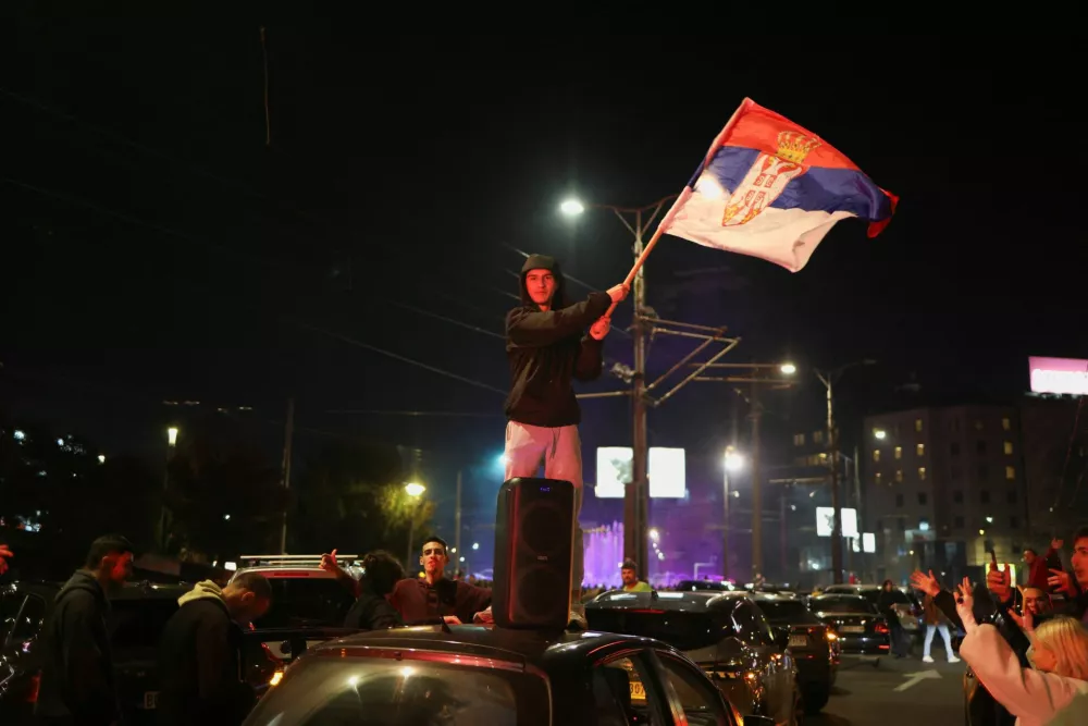 Supporters of the electoral list "Student List - Students Win" celebrate following the first results of the parliamentary election in Belgrade, Serbia, October 25, 2026. REUTERS/Marko Djurica