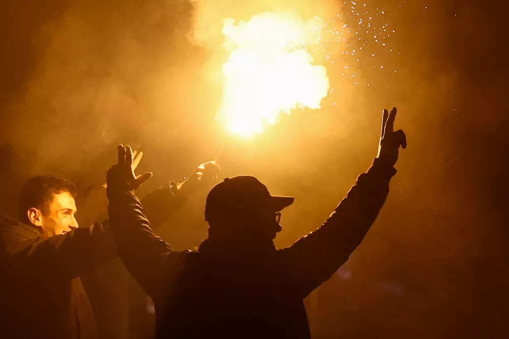 Supporters of the electoral list "Student List - Students Win" celebrate following the first results of the parliamentary election in Belgrade, Serbia, October 25, 2026. REUTERS/Zorana Jevtic