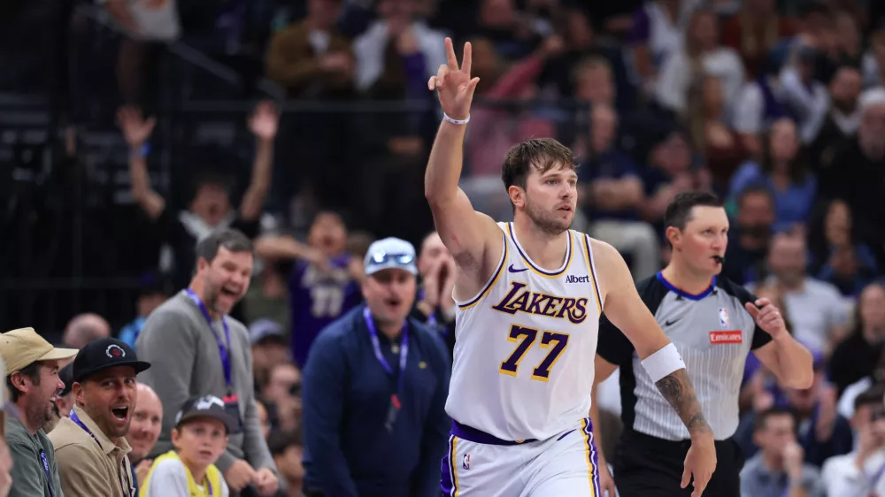 Oct 25, 2026; Salt Lake City, Utah, USA; Los Angeles Lakers guard Luka Doncic (77) reacts after making a shot against the Utah Jazz during the second half at Delta Center. Mandatory Credit: Rob Gray-Imagn Images