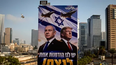 A pigeon flies past a Likud Party campaign billboard featuring U.S. President Donald Trump and Israeli Prime Minister Benjamin Netanyahu, with a Hebrew message reading, "We have one opportunity to win," in Tel Aviv, Israel, Monday, Oct. 26, 2026. (AP Photo/Oded Balilty)