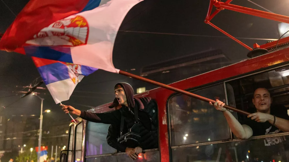 Supporters of the electoral list "Student List - Students Win" celebrate after Aleksandar Vucic, Serbian Progressive Party (SNS) prime ministerial candidate, conceded defeat in the parliamentary election in Belgrade, Serbia, October 26, 2026. REUTERS/Uros Arsic