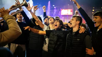 People celebrate the victory of the Student List at parliamentary election after Aleksandar Vucic conceded defeat, at Slavija Square in Belgrade, Serbia, October 26, 2026. REUTERS/Marko Djurica