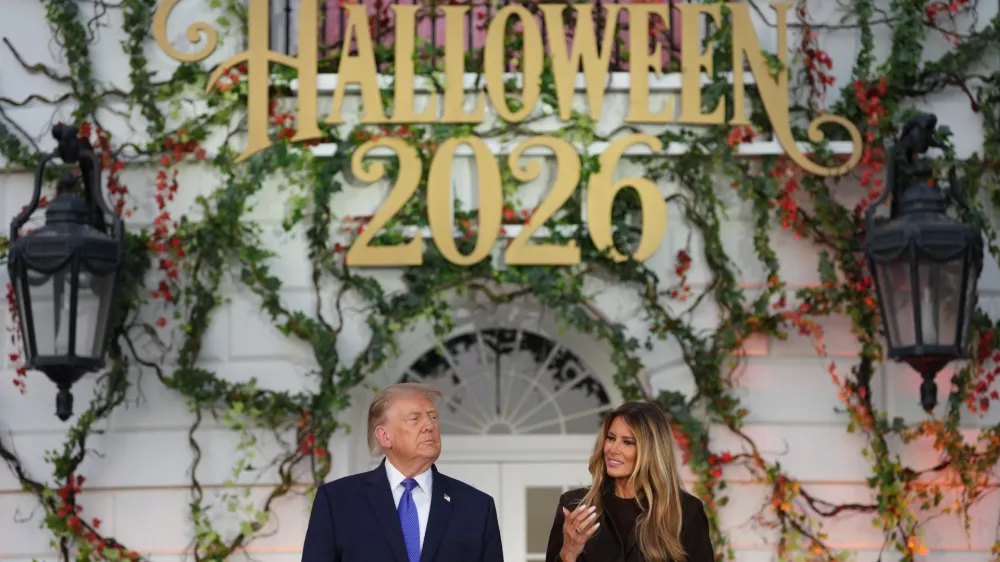 President Donald Trump and first lady Melania Trump attend a Halloween event on the South Lawn of the White House, Thursday, Oct. 29, 2026, in Washington. (AP Photo/Mark Schiefelbein)