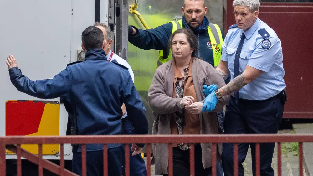 FILE- Erin Patterson arrives at the Supreme Court of Victoria in Melbourne, Australia, Monday, Aug. 25, 2025. (Jason Edwards/AAP Image, POOL via AP, File)