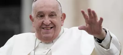 Pope Francis waves as he leaves after his weekly general audience in St. Peter's Square at The Vatican, Wednesday, Nov.20, 2024. (AP Photo/Gregorio Borgia)